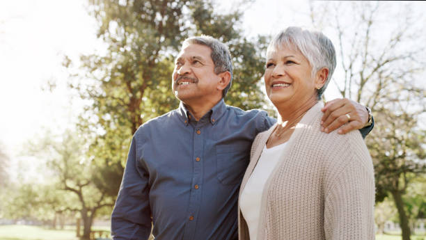 Elderly Couple Taking a Walk in the Park